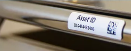 ETICHETTE F.TO 70X30MM POLYESTERE COLLANTE PERMANENTE TAG RFID UHF EPC PER CESPITI RFID ON-METAL SERVICE PER LA INIZIALIZZAZIONE CHIP E STAMPA A TRASFERIMENTO TERMICO SU FRONTALE CON LOGO-QRCODE E DATO IN CHIARO IN ROTOLO DA 500PZ.CONF.2 ROTOLI